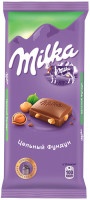 Шоколад Milka молочный с цельным фундуком, 90г