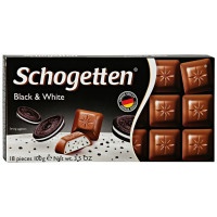 Шоколад молочный Schogetten BLACK&WHITE с начинкой Ванильный крем с кусочками печенья и какао 100г